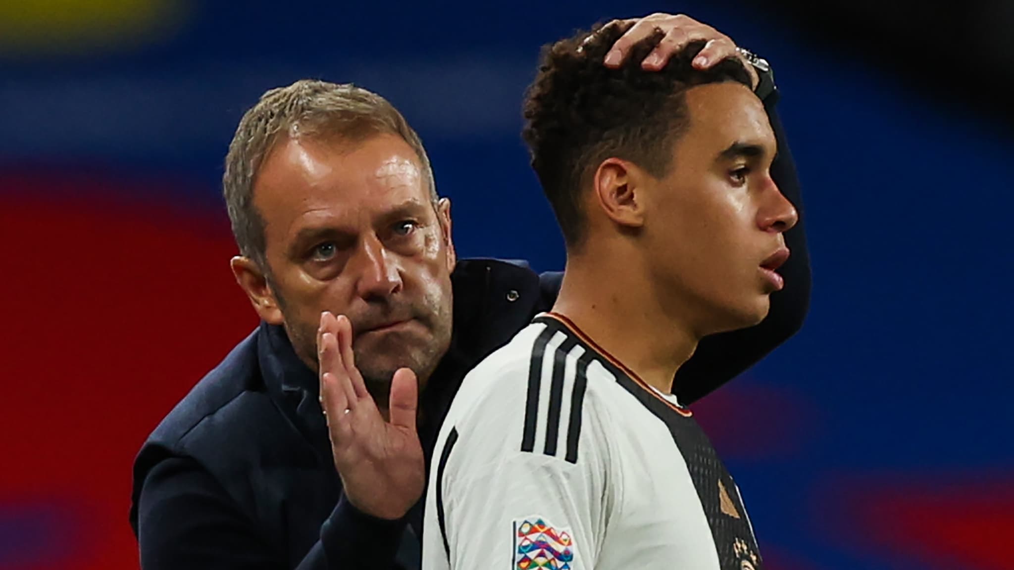 Hans-Dieter Flick avec Jamal Musiala en septembre 2022
