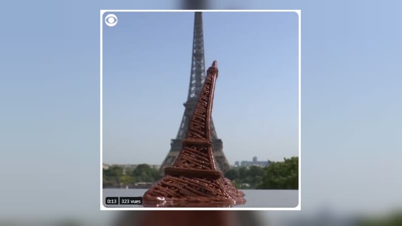Une tour Eiffel en chocolat devant la vraie, le 25 juillet 2019 à Paris.