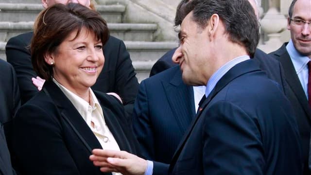 Lors du déplacement à Lille de Nicolas Sarkozy, le chef de l'Etat et la première secrétaire du Parti socialiste, Martine Aubry, se sont livrés jeudi à un duel sans concession à cent jours du premier tour de l'élection présidentielle. /Photo prise le 12 ja