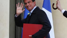 Manuel Valls à son entrée à l'Elysée lundi soir, pour consulter François Hollande sur le remaniement.