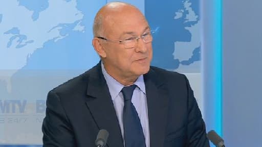 Michel Sapin, le ministre du Travail, a défendu les orientations budgétaires pour 2014, sur le plateau de BFMTV.