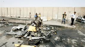 Un double attentat à la voiture piégée visant des pèlerins chiites a fait samedi 25 morts au moins à Bagdad. /Photo prise le 16 juin 2012/REUTERS/Ali al-Mashhadani