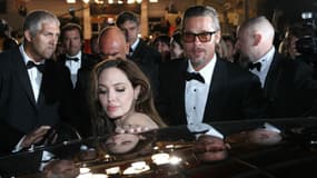 Brad Pii (ici avec son épouse Angelina Jolie lors du Festival de Cannes 2014) donnera le coup d'envoi des 24 Heures du Mans le 18 juin. Il a notamment déjà assisté au Grand prix de Monaco de Formule 1.