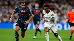 Manuel Akanji face à Vinicius Jr lors de Real Madrid-Manchester City en Ligue des champions le 9 avril 2024