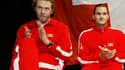 Marc Rosset et Roger Federer avec l'équipe de Suisse, en 2004 