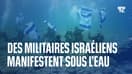 Des militaires israéliens manifestent sous l’eau contre la réforme de la justice 