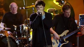 Bertrand Cantat, Denis Barthe et Jean-Paul Roy, membres du groupe Noir Désir, en 2002, aux Victoires de la musique.