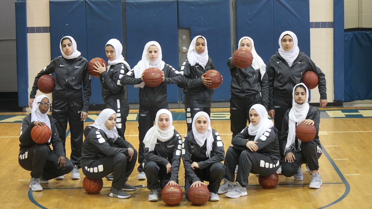 Les joueuses voilées de l'équipe féminine de la Salam High School Les joueuses voilées de l'équipe féminine de la Salam High School