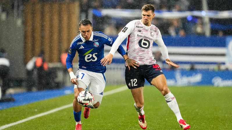Thomas Meunier, latéral de Lille, au duel avec le joueur de Srasbourg Diego Moreira, 25 janvier 2025