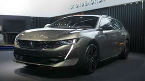 Dans un marché dominé par les SUV, Peugeot joue l'originalité en présentant au salon automobile de Paris une version break de la 508 SW. - Peugeot