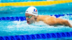 Léon Marchand lors d'une épreuve de papillon aux Mondiaux de natation à Budapest en juin 2022