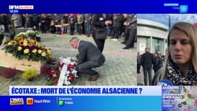 Écotaxe: plusieurs manifestants mettent en scène la mort de l'économie alsacienne