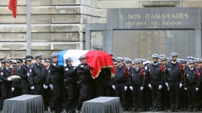 Les cercueils des victimes de l'attaque de la préfecture de police de Paris, lors de la cérémonie d'hommage du 8 octobre 2019.