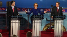 Carly Fiorina, entourée de ses rivaux Scott Walker, et John Kasich, mercredi 16 septembre, lors du deuxième débat des candidats républicains, sur CNN.
