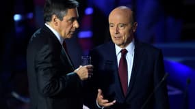 Alain Juppé et François Fillon lors du deuxième débat de la primaire à droite.