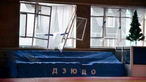 Dégâts dans un gymnase de Tcheliabinsk, en Russie. Une pluie de météorites s'est abattue vendredi matin dans le ciel de la région de l'Oural, dans le centre de la Russie, faisant au moins 400 blessés, pour la plupart victimes de bris de verre.