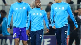 Patrice Evra entouré Rolando et Doria
