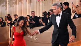 L'acteur américain George Clooney et son épouse Amal Clooney assistent à la 83e cérémonie des Golden Globes à l'hôtel Beverly Hilton de Beverly Hills, en Californie, le 11 janvier 2026.