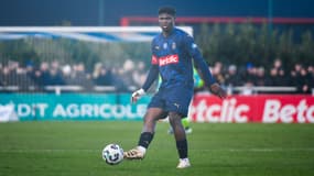 Emmanuel Agbadou avec le Stade de Reims en décembre 2024.