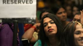 En octobre 2013, des personnes attendent à Bombay, lors d'un séminaire sur les transgenres.