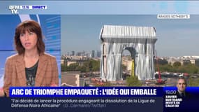Les touristes émerveillés par l'empaquetage de l'Arc de Triomphe