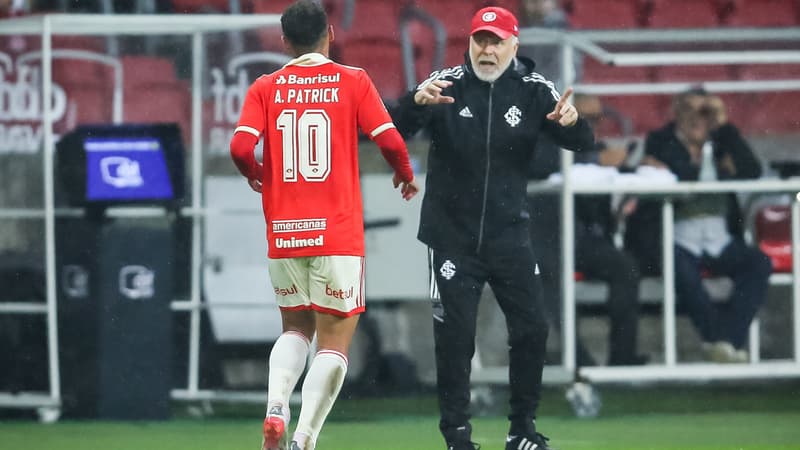 A. Patrick et son entraîneur M. Menezes