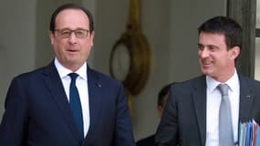 François Hollande et Manuel Valls voient leur cote de confiance augmenter légèrement en novembre, selon un sondage Elabe. 