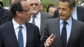 Qu'il s'agisse de François Hollande, ici avec le chef de l'Etat en Corrèze en avril, ou de Martine Aubry, le candidat PS battrait Nicolas Sarkozy au deuxième tour de la présidentielle, selon un sondage Ifop diffusé jeudi. /Photo prise le 28 avril 2011/REU