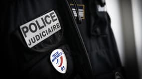 Un badge de Police Judiciaire, le 13 juin 2024. 