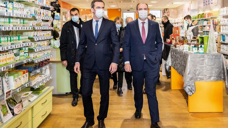 Olivier Véran et Jean Castex dans une pharmacie
