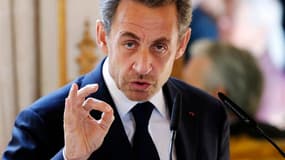 Nicolas Sarkozy a suspendu tout recours contre sa mise en examen pour abus de faiblesse dans l'affaire Bettencourt dans l'attente d'un avis du Conseil supérieur de la magistrature. /Photo prise le 27 mars 2013/REUTERS/François Lenoir
