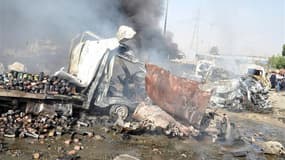 Des "attaques terroristes" ont fait des dizaines de morts et de blessés jeudi matin dans le sud de Damas, selon la télévision d'Etat syrienne. Des images montraient des dizaines de véhicules calcinés, certains contenant des corps déchiquetés ou mutilés. /