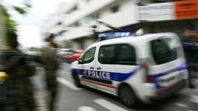 Une voiture de police. (Illustration)