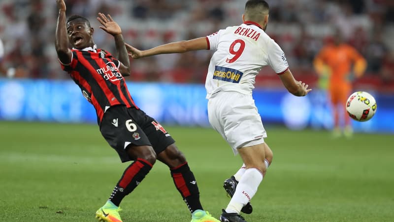 Le Niçois Seri (en rouge et noir) et le Lillois Benzia au duel