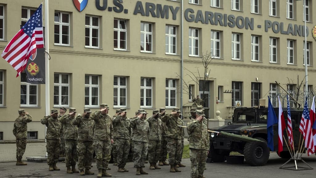 Des soldats américains participent à la cérémonie d'inauguration de la garnison permanente de l'armée américaine en Pologne, au Camp Kosciuszko à Poznan, le 21 mars 2023. Des soldats américains participent à la cérémonie d'inauguration de la garnison permanente de l'armée américaine en Pologne, au Camp Kosciuszko à Poznan, le 21 mars 2023.