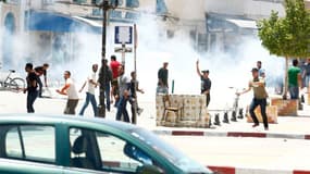 Des affrontements ont éclaté dimanche à Kairouan (photo) et Tunis entre la police et des salafistes protestant contre l'interdiction du rassemblement annuel de leur organisation, Ansar al Charia, dont le gouvernement islamiste modéré juge qu'elle représen