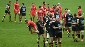 La joie des joueurs du club anglais des Wasps, après leur victoire à domicile, 30-22 face à Toulouse, lors de la 3e journée de la Coupe d'Europe, le 15 janvier 2022 à Coventry