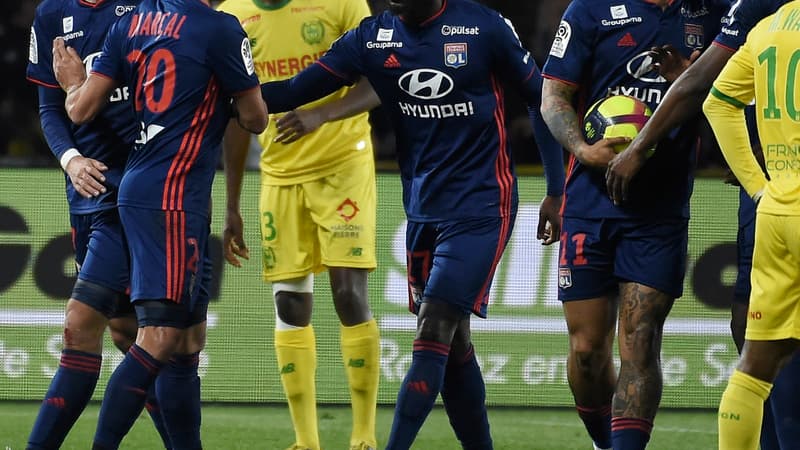Maxwell Cornet (OL) et ses coéquipiers. 