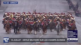 La fanfare du régiment de cavalerie de la Garde républicaine défile sur les Champs-Élysées