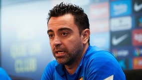 Xavi lors d'une conférence de presse du Barça
