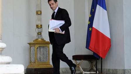 Nicolas Sarkozy a lancé mercredi en conseil des ministres un appel à la lucidité et au sang-froid face à la crise nucléaire du Japon. /Photo prise le 16 mars 2011/REUTERS/Gonzalo Fuentes