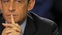 Les socialistes Dominique Strauss-Kahn (en haut) et Martine Aubry (en bas) battraient tous deux largement Nicolas Sarkozy au second tour de la présidentielle de 2012, selon un sondage BVA-Orange-L'Express-France Inter. /Photos d'archives/Denis Balibouse/P