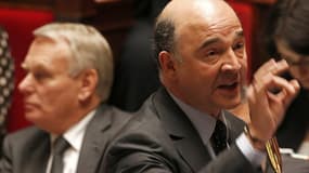 Pierre Moscovici et Jean-Marc Ayrault à l’Assemblée.