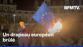 Un agriculteur de la Coordination rurale brûle un drapeau de l'Union européenne