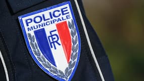Un badge de la police municipale.