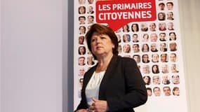 François Hollande, arrivé en tête de la primaire socialiste pour désigner le candidat à la présidentielle de 2012, demande à Martine Aubry le "respect". /Photo prise le 9 octobre 2011/REUTERS/Pascal Rossignol