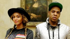 Beyoncé et Jay-Z posent devant le Joconde, le 11 octobre 2014.