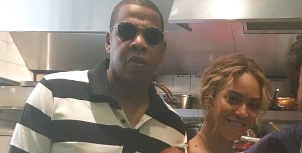 Jay Z, Beyoncé et Jean Imbert dans son restaurant L'Acajou, à Paris.
