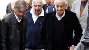 L'acteur Jean-Paul Belmondo, avec son fils Paul et l'acteur Charles Gérard aux obsèques de Jean Rochefort.