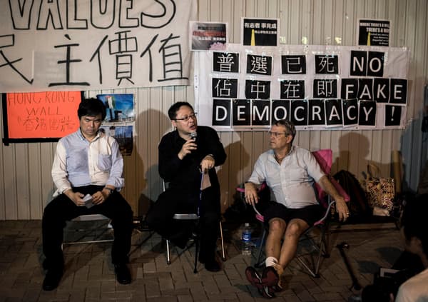 Des fondateurs du mouvement Occupy Central parlent à la presse, le 29 août 2014.